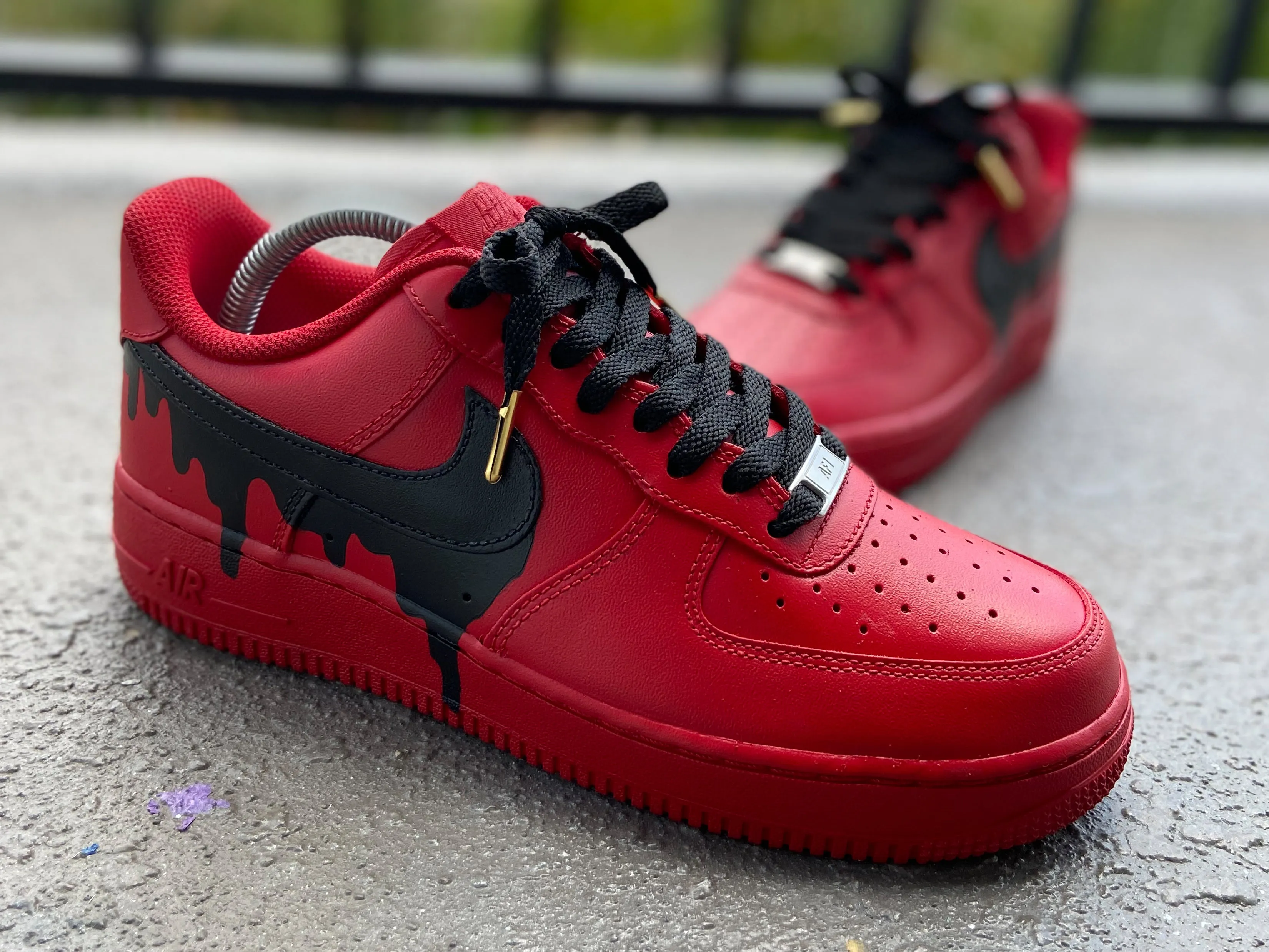 Custom Red Drip Air Force 1s.